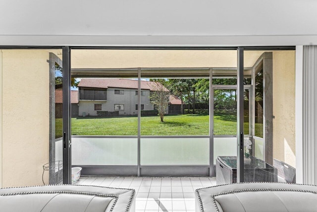 10 Via De Casas Sur Unit 104, Boynton Beach, FL 33426 - entryway featuring tile patterned flooring and a textured wall