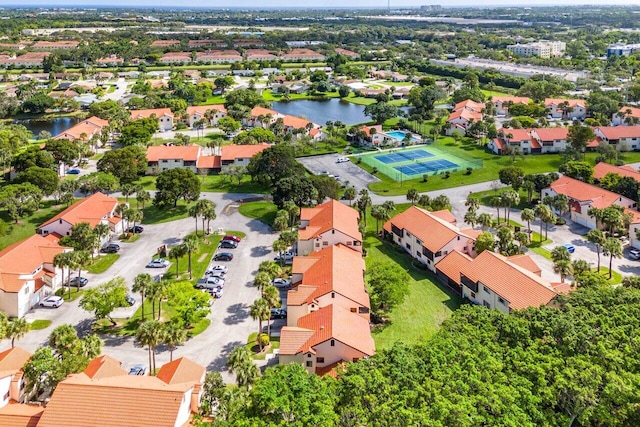 drone / aerial view with a water view