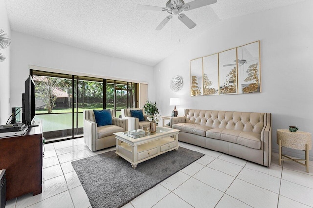 tiled living room featuring lofted ceiling, a textured ceiling, and ceiling fan