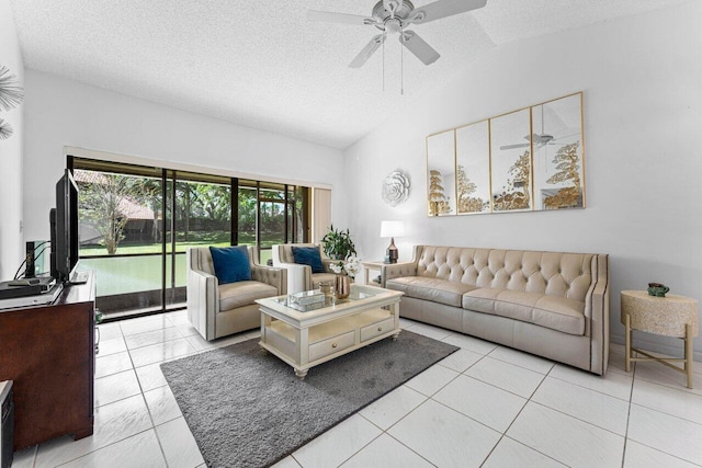 10 Via De Casas Sur Unit 104, Boynton Beach, FL 33426 - living room featuring lofted ceiling, a ceiling fan, a textured ceiling, and light tile patterned flooring