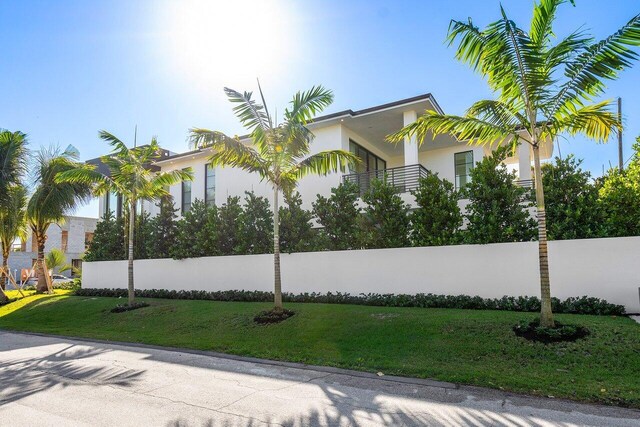 view of home's exterior featuring a yard