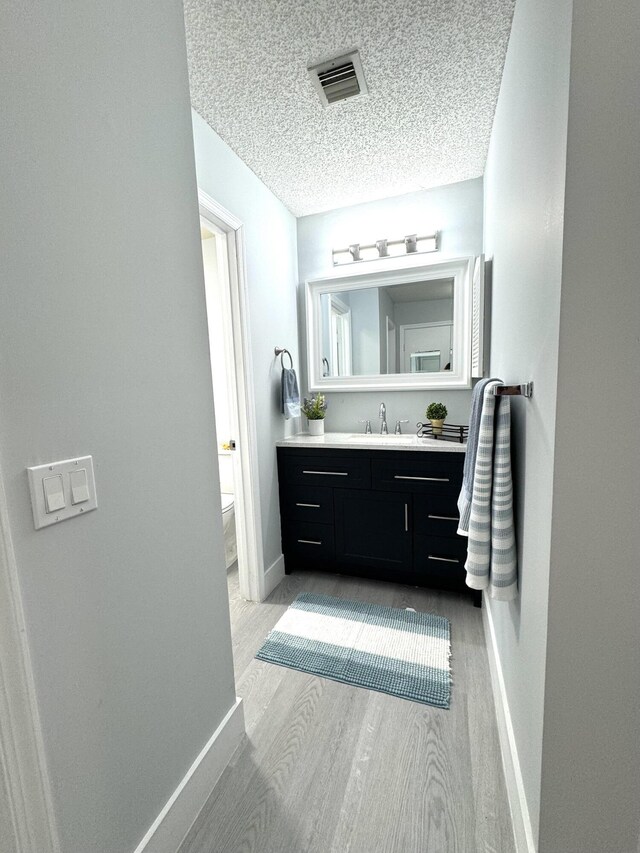 hallway with light wood-type flooring