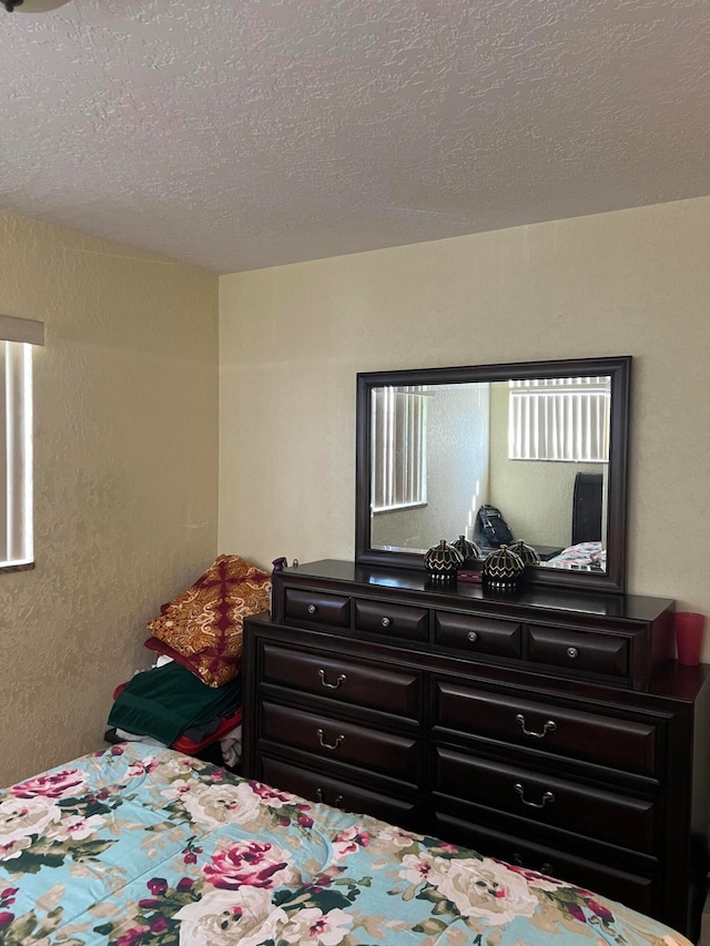 bedroom with a textured ceiling