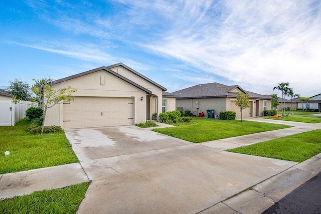 single story home with a front yard and a garage