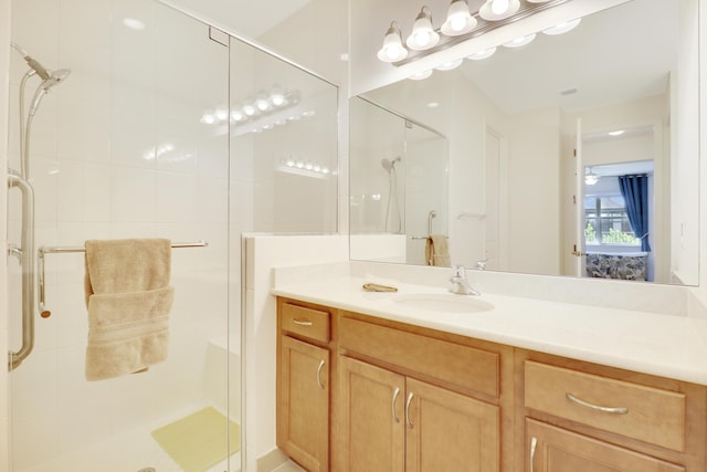 bathroom with vanity and an enclosed shower