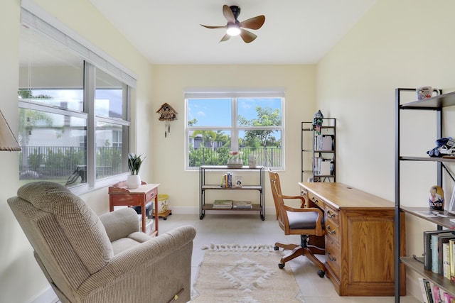 office featuring light tile patterned flooring and ceiling fan