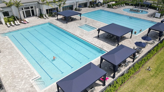 view of pool featuring a gazebo and a patio