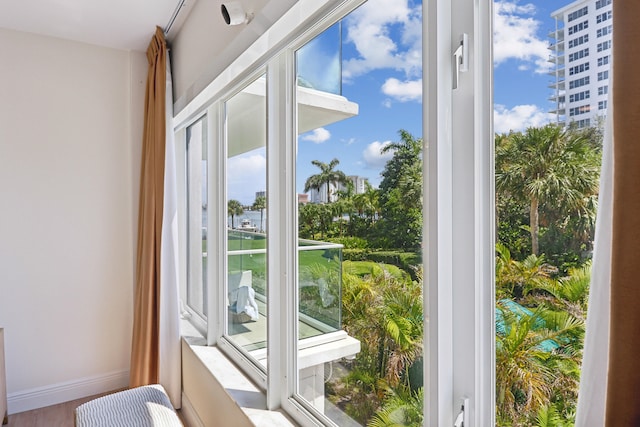 doorway to outside with hardwood / wood-style flooring