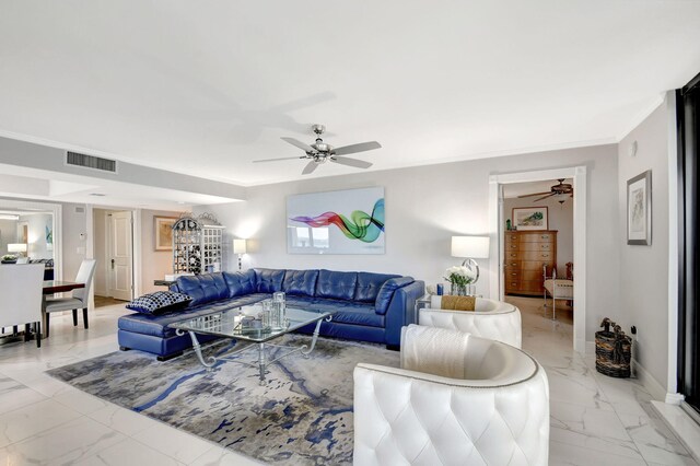 living room with crown molding and ceiling fan