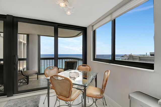 dining area with a water view