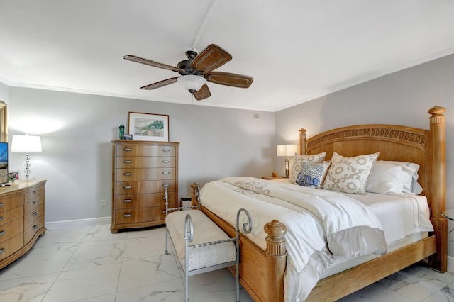 bedroom with ceiling fan and ornamental molding