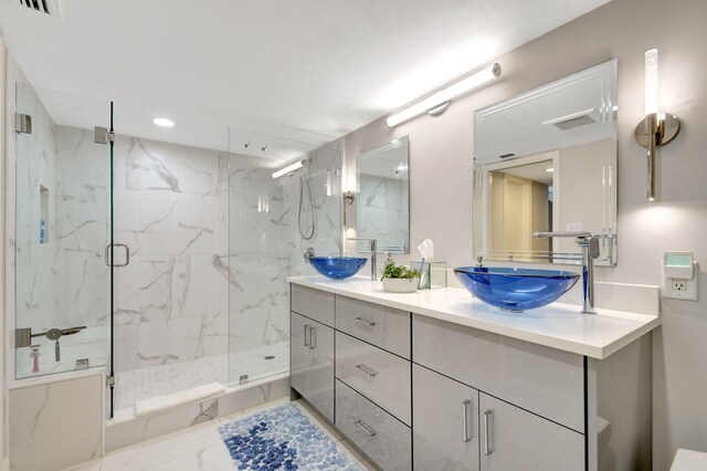 bathroom featuring vanity and walk in shower