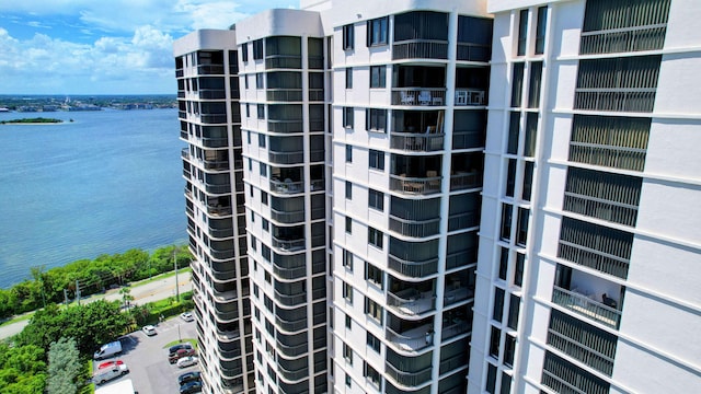 view of building exterior featuring a water view