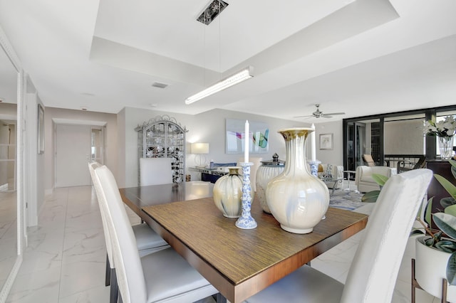 dining room with ceiling fan