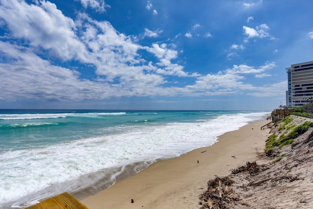 property view of water featuring a beach view