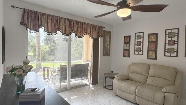 living room with ceiling fan