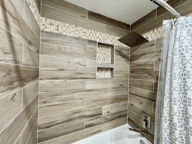 bathroom with shower / tub combo with curtain