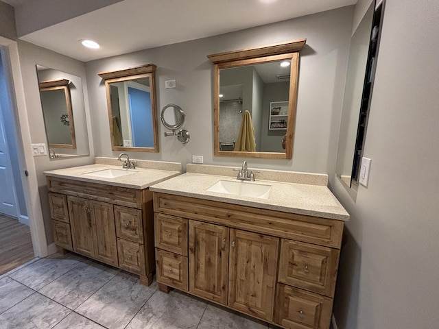 bathroom with vanity and hardwood / wood-style flooring