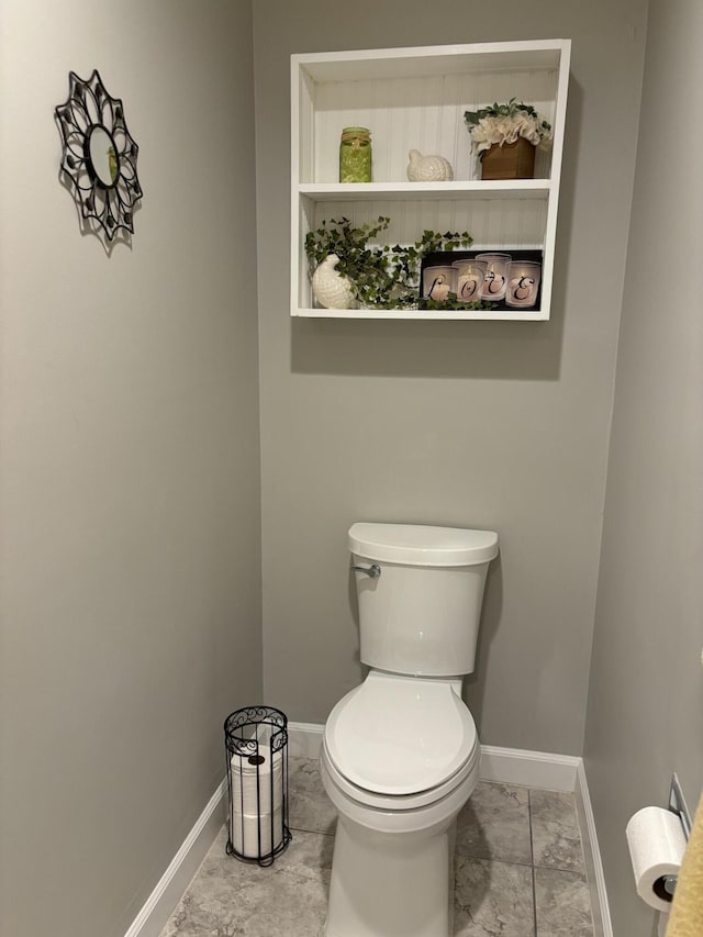 bathroom featuring toilet