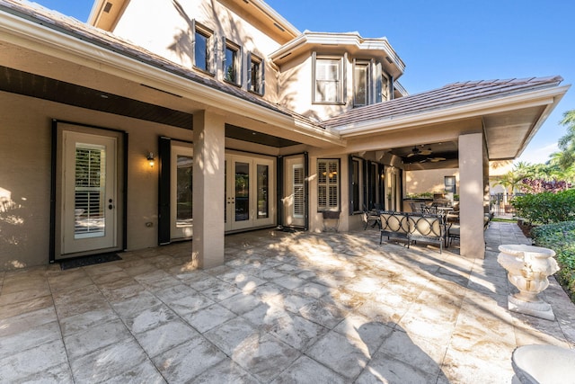 view of patio / terrace featuring ceiling fan