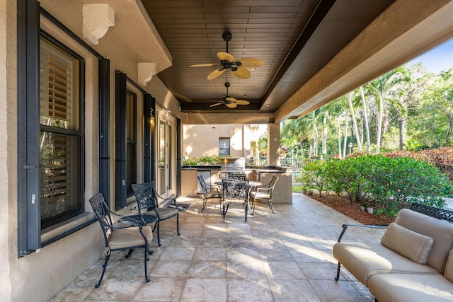 view of patio featuring ceiling fan and an outdoor living space