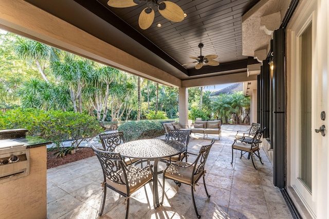 view of patio featuring ceiling fan and an outdoor living space