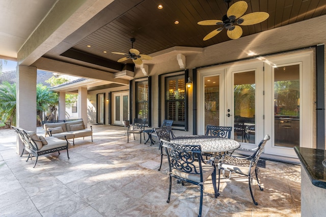 view of patio / terrace with ceiling fan, an outdoor hangout area, and french doors