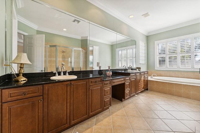 bathroom featuring tile patterned flooring, separate shower and tub, crown molding, and vanity