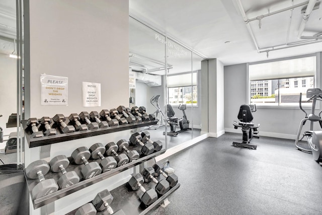 workout area featuring plenty of natural light