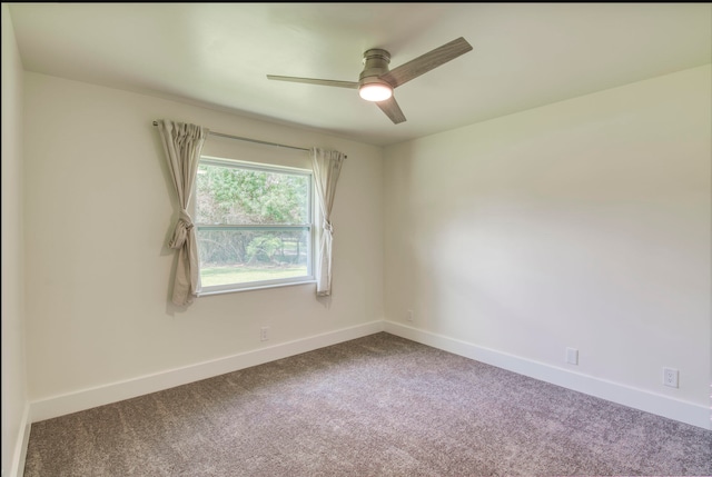 carpeted empty room with ceiling fan