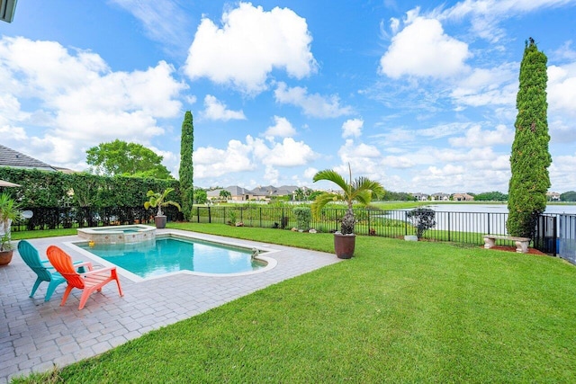 view of swimming pool with a yard, an in ground hot tub, and a patio