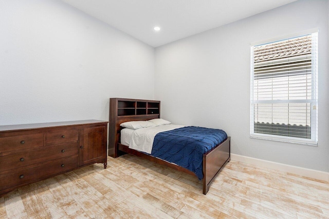 bedroom featuring light hardwood / wood-style floors