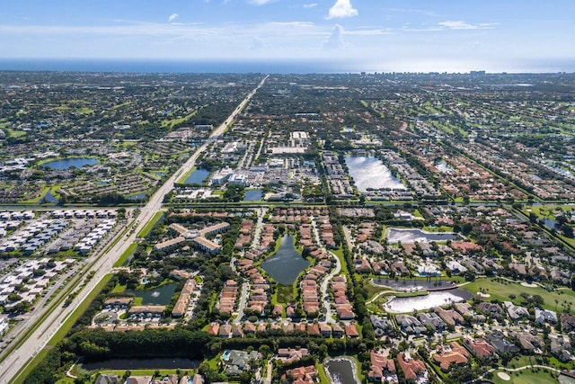 drone / aerial view featuring a water view