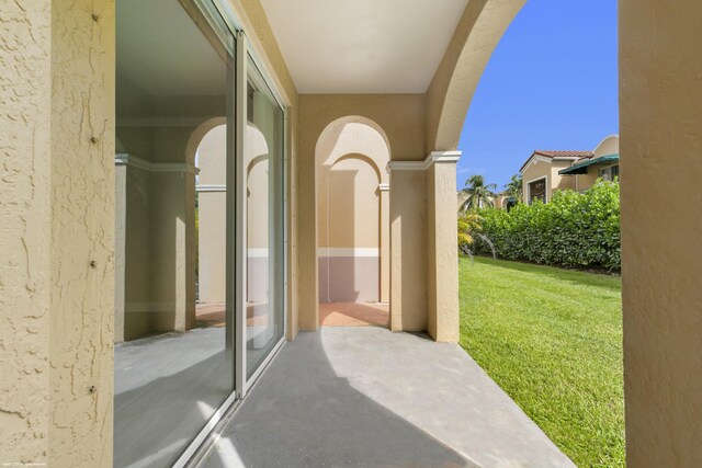 exterior space with a patio and a yard