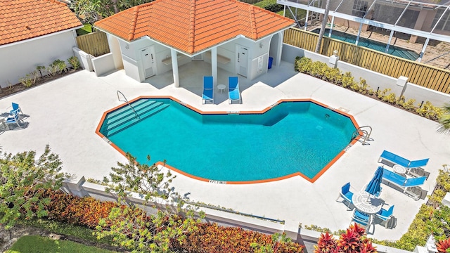 view of swimming pool featuring a patio