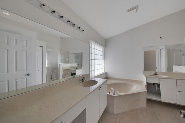 bathroom featuring tile patterned floors, vanity, lofted ceiling, and shower with separate bathtub