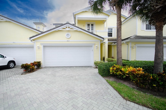 front of property with a garage