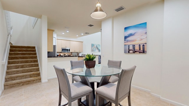 view of tiled dining space