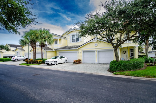 view of front of property with a garage