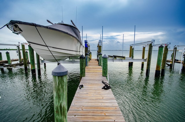 dock area featuring a water view