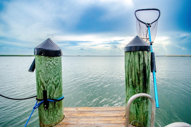 dock area featuring a water view