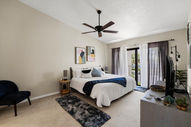 bedroom with a textured ceiling, vaulted ceiling, access to outside, light carpet, and ceiling fan