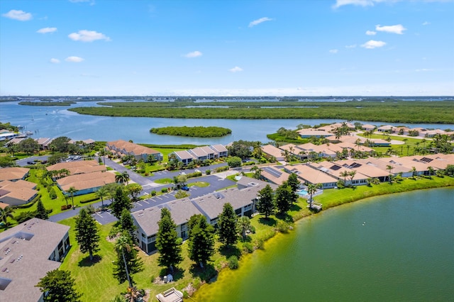 drone / aerial view with a water view