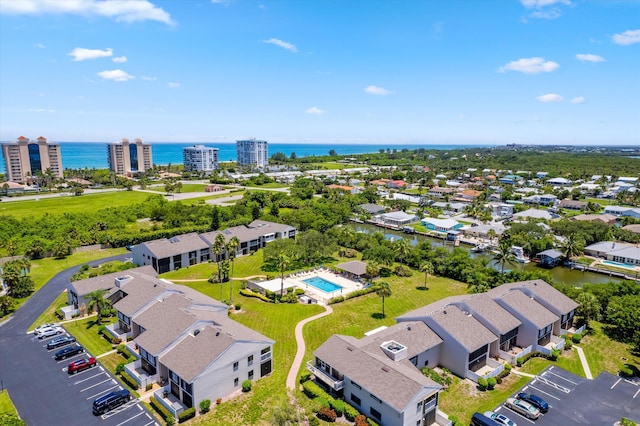 birds eye view of property featuring a water view