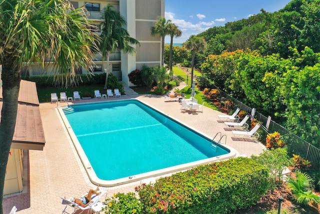 view of swimming pool with a patio area