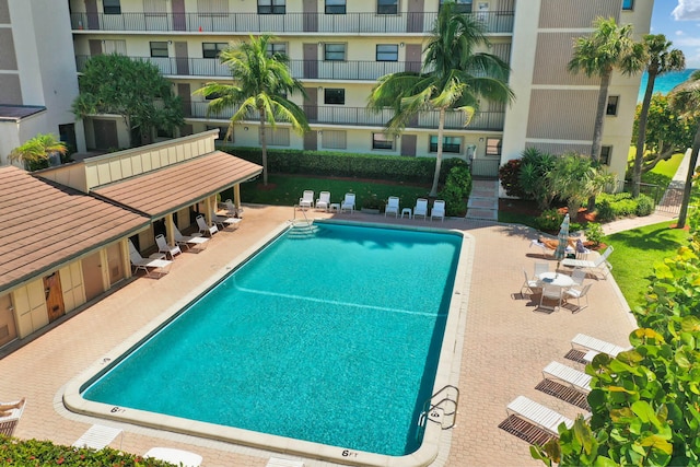 view of swimming pool featuring a patio area