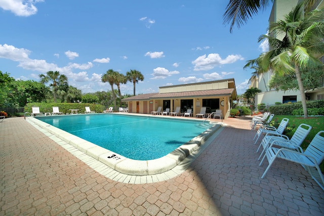 view of swimming pool featuring a patio