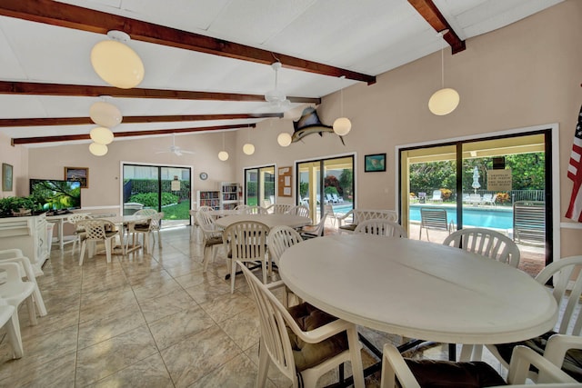 dining space featuring beamed ceiling, ceiling fan, and high vaulted ceiling