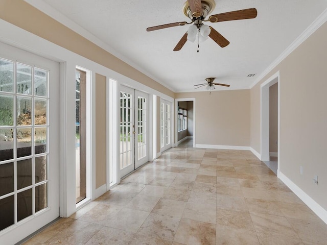 unfurnished room with ornamental molding and ceiling fan