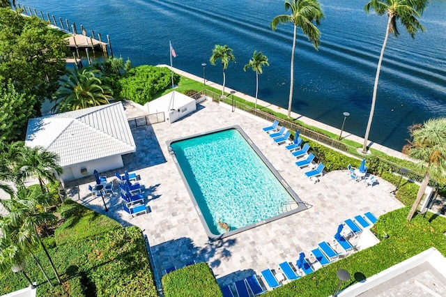 birds eye view of property with a water view